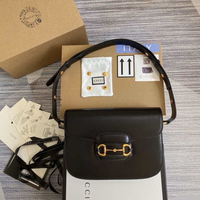 G*u*i top handle bags